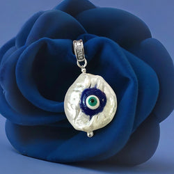 Baroque pearl pendant decorated with evil eye detail