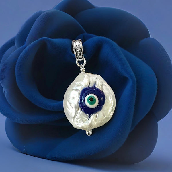 Baroque pearl pendant decorated with evil eye detail