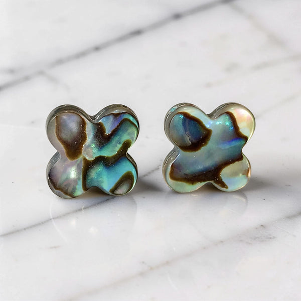 Clover-shaped abalone stud earrings with sterling silver posts, iridescent shell design, handmade 12mm everyday earrings.