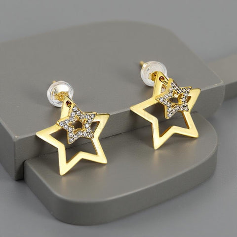 Sterling silver double sided star earrings with rhinestone front and larger star back jacket
