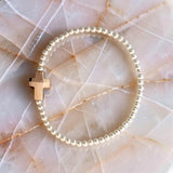 Elasticated Bracelets; Rose-gold Swarovski Cross with Sterling Silver Beads