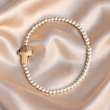 Elasticated Bracelets; Rose-gold Swarovski Cross with Sterling Silver Beads