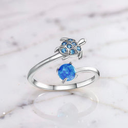 Sterling silver turtle open ring with blue opal