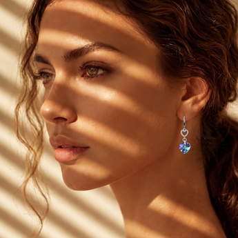 Light heart crystal earrings with sterling silver heart-shaped hooks, featuring beautiful iridescent colours that shimmer with every movement