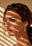 Light heart crystal earrings with sterling silver heart-shaped hooks, featuring beautiful iridescent colours that shimmer with every movement