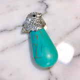 Turquoise Necklace with Silver Bird Bail