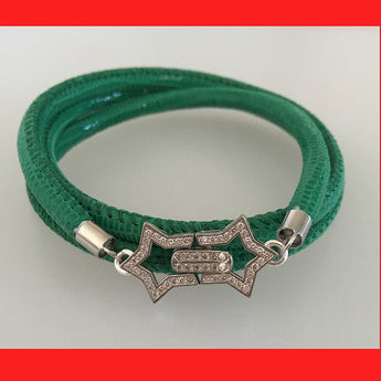 Green bracelet with a decorative clasp 