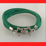 Green bracelet with a decorative clasp 