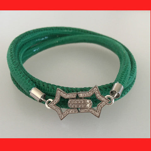 Green bracelet with a decorative clasp 
