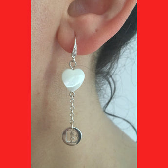 Silver earring with heart-shaped pendant and letter 'B' 