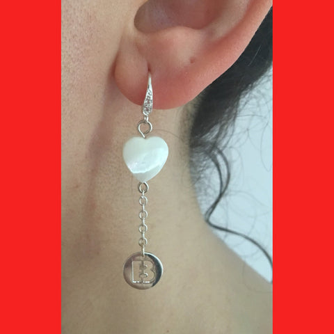Silver earring with heart-shaped pendant and letter 'B' 
