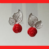 Earrings; Rose Shaped Coral on Leaf studs