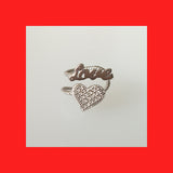 Sterling silver heart and love ear cuff with cubic zirconia, designed for the right ear.