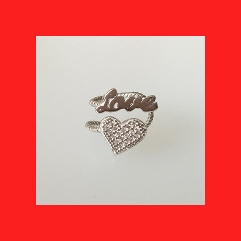 Sterling silver heart and love ear cuff with cubic zirconia, designed for the right ear.