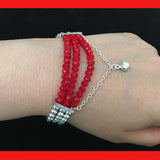 Multi Strands Elasticated Bracelet with Red Crystals and Sterling Silver Balls