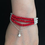 Multi Strands Elasticated Bracelet with Red Crystals and Sterling Silver Balls