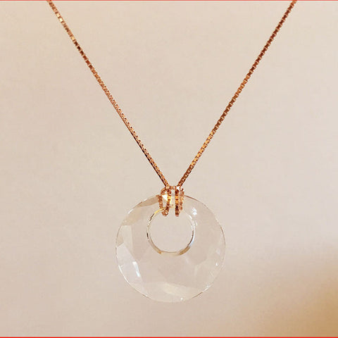A Swarovski crystal victory pendant necklace with a rose-gold plated sterling silver chain