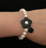 onyx flower freshwater pearl bracelet sterling silver